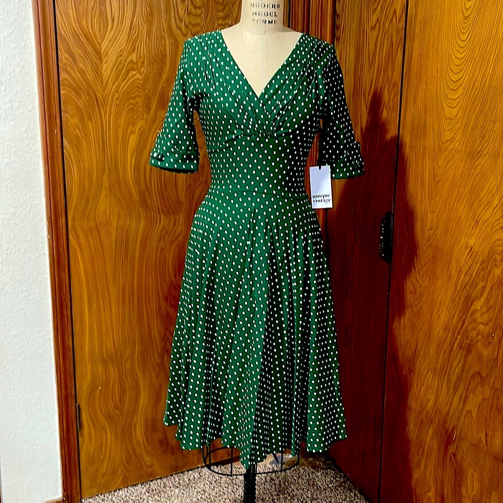 Unique Vintage 1950’s green and white pin dot Delores swing dress with sleeves.